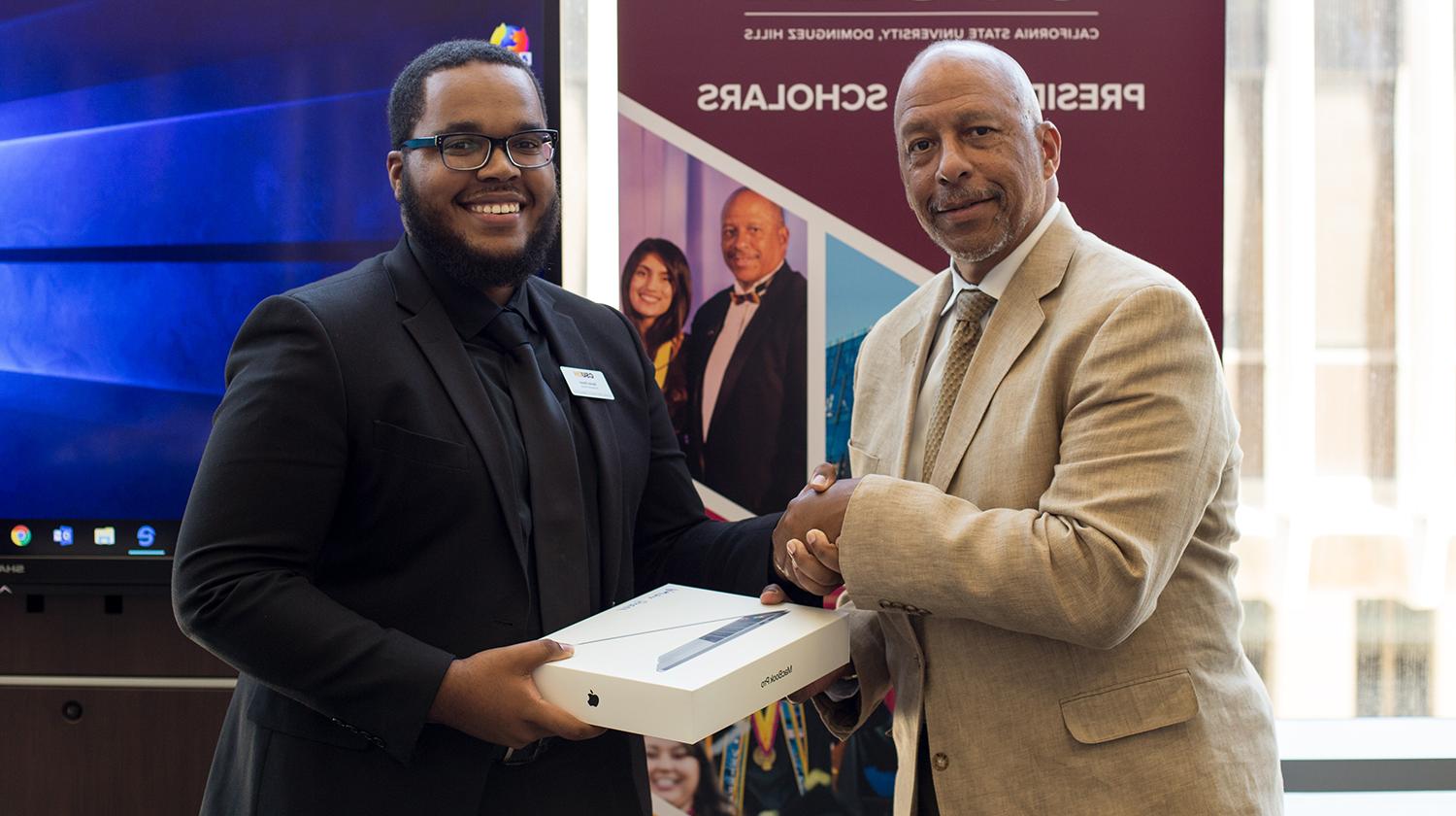 Student with president and laptop